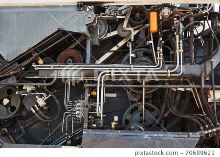 Harvesters and combine parts at the plant are waiting for sales, tractors and agricultural machinery, maintenance and exports Harvesters and combine parts at the plant are waiting for sales, tractors and agricultural machinery, maintenance and exports 70689621