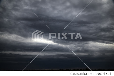 beautiful dark dramatic sky with stormy clouds beautiful dark dramatic sky with stormy clouds 70691301