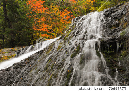 Sanbon Falls in autumn colors Norikura Kogen 70693875