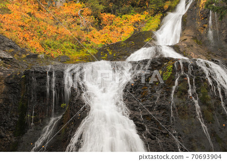 Sanbon Falls in autumn colors Norikura Kogen 70693904
