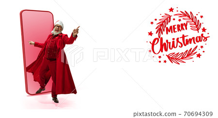 Emotional Santa Claus greeting with New Year 2021 and Christmas. Flyer with copyspace 70694309