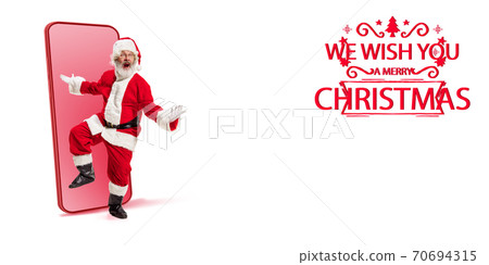 Emotional Santa Claus greeting with New Year 2021 and Christmas. Flyer with copyspace 70694315