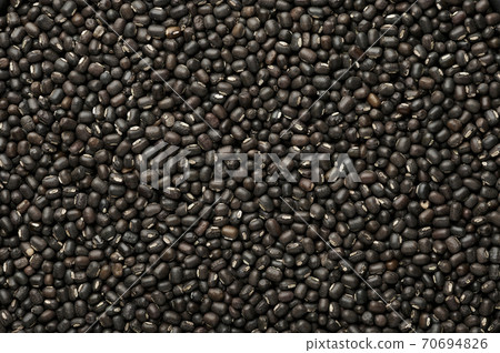 Black Gram or Urad Beans or Mung Beans texture. Vigna Mungo is popular indian cuisine food. 70694826