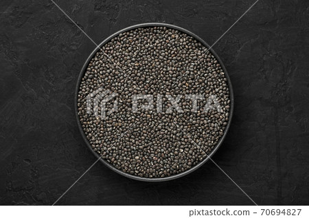 Black Gram or Urad Beans or Mung Beans in bowl on dark slate table top. Indian cuisine food 70694827