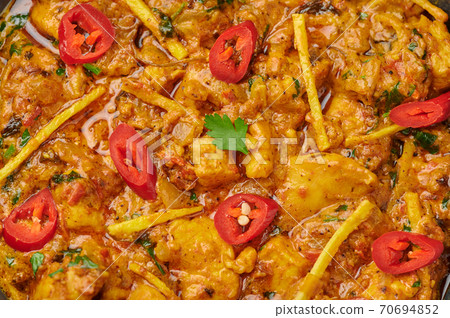 Chicken Handi close up. Murgh Chicken is indian cuisine curry Chicken Handi close up. Murgh Chicken is indian cuisine curry 70694852