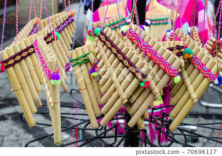 Paixiao or zampona ancient musical wind instrument on the street market, Wroclaw, Poland. 70696117