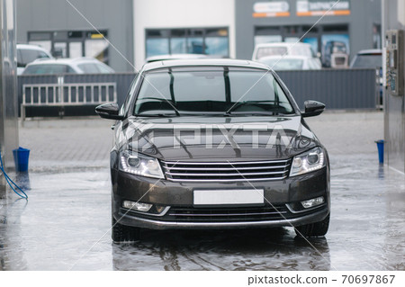 Dirty car on car washing. Cold weather Dirty car on car washing. Cold weather 70697867