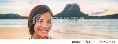 Beach selfie Tropical cruise vacation smiling Asian woman smiling taking photo on Bora bora island paradise, summer vacation landscape panoramic banner Beach selfie Tropical cruise vacation smiling Asian woman smiling taking photo on Bora bora island paradise, summer vacation landscape panoramic banner 70698113