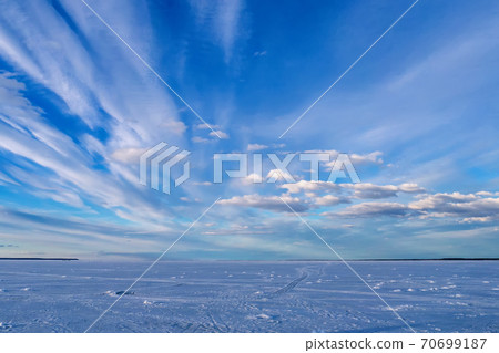 blue sky with clouds on a winter day over the ice of the river blue sky with clouds on a winter day over the ice of the river 70699187