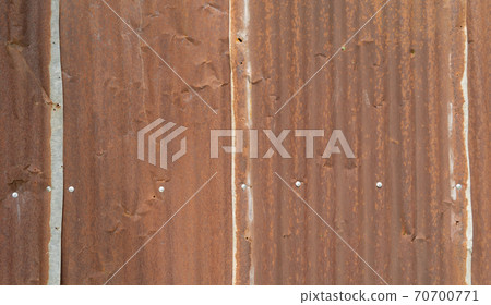 Metal steel strips. Rusty corrugated iron metal, Zinc steel wall, pattern texture background. Close-up of exterior architecture material for design decoration background. Metal steel strips. Rusty corrugated iron metal, Zinc steel wall, pattern texture background. Close-up of exterior architecture material for design decoration background. 70700771