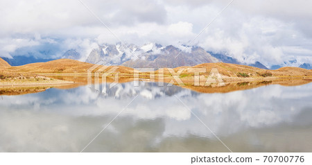 Clouds on mountain lake Koruldi. Upper Svaneti, Georgia, Europe. Caucasus Clouds on mountain lake Koruldi. Upper Svaneti, Georgia, Europe. Caucasus 70700776
