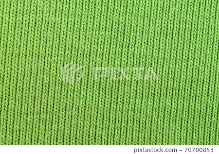 The texture of the fabric is bright green. Material for making shirts and blouses 70700853