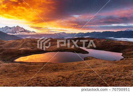 Sunset on mountain lake Koruldi. Upper Svaneti, Georgia Europe. Caucasus mountains. 70700951