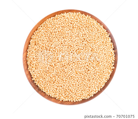 Amaranth seeds in wooden bowl, isolated on white background. Organic dry raw amaranth beans. Top view. Amaranth seeds in wooden bowl, isolated on white background. Organic dry raw amaranth beans. Top view. 70701075