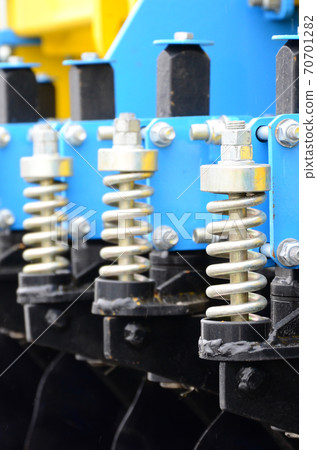 Spring system of agricultural seeder close up 70701282
