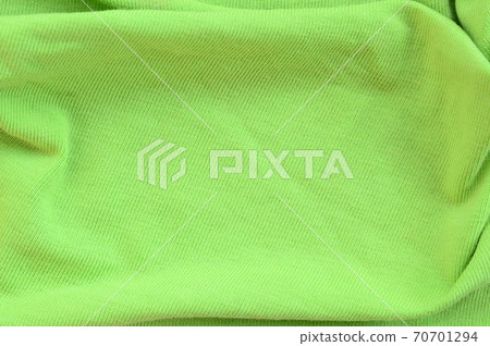 The texture of the fabric is bright green. Material for making shirts and blouses The texture of the fabric is bright green. Material for making shirts and blouses 70701294