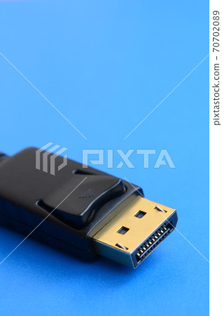 20-pin male DisplayPort gold plated connector for a flawless connection on a blue background 70702089