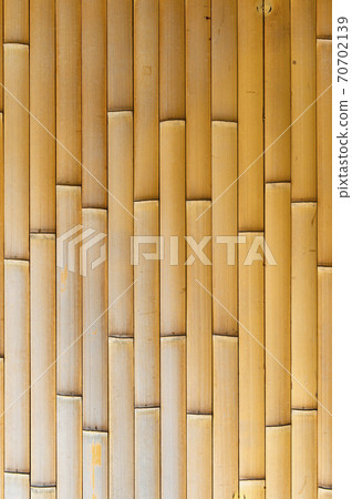 One side of the bamboo fence 70702139