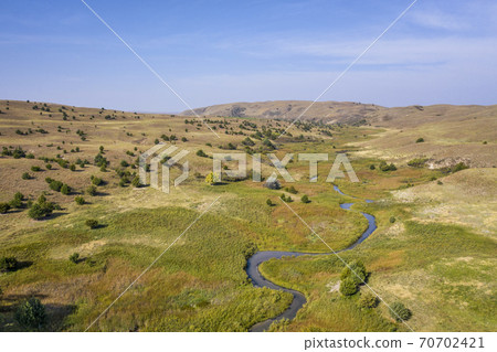 stream meandering in Nebraska Sandhills stream meandering in Nebraska Sandhills 70702421