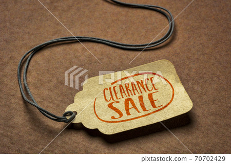 clearance sale sign on a price tag 70702429