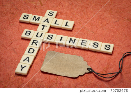 small business Saturday - crossword and blank price tag 70702478