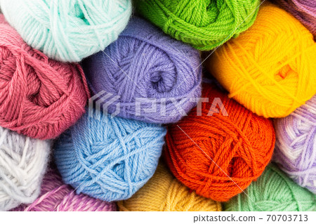 Stack of knitting yarn clews 70703713