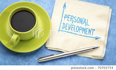 personal development handwriting on a napkin 70703754
