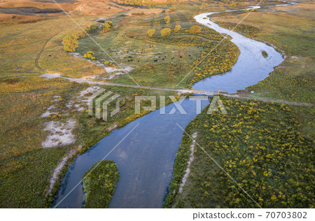 river meandering in Nebraska Sandhills river meandering in Nebraska Sandhills 70703802