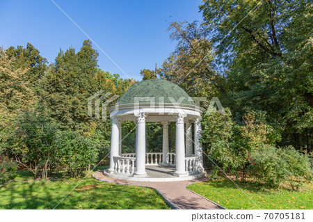 White stone garden house in a summer park 70705181