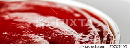 Organic ketchup, tomato sauce closeup, food background and homemade recipe Organic ketchup, tomato sauce closeup, food background and homemade recipe 70705405