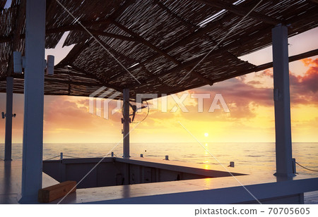 Scenic view of sandy beach on the beach with sun beds and umbrellas open against the sea and mountains. Amara Dolce Vita Luxury Hotel. Resort. 70705605