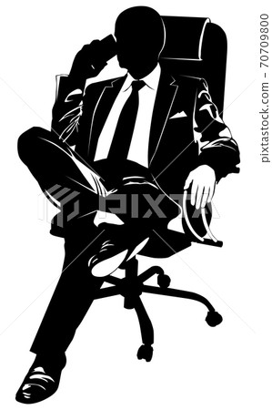 A man in a business suit talking on a cell phone A man in a business suit talking on a cell phone 70709800