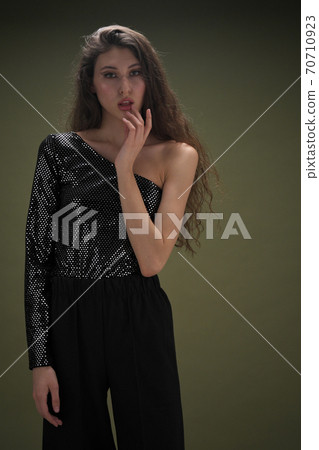 A beautiful young tall girl with long 