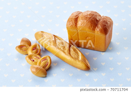 Finely crafted miniature foods --- baguette bread 70711704