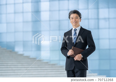 Middle businessman, male employee 70712268