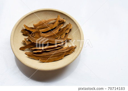 Dried lingzhi mushroom slices on white Dried lingzhi mushroom slices on white 70714183