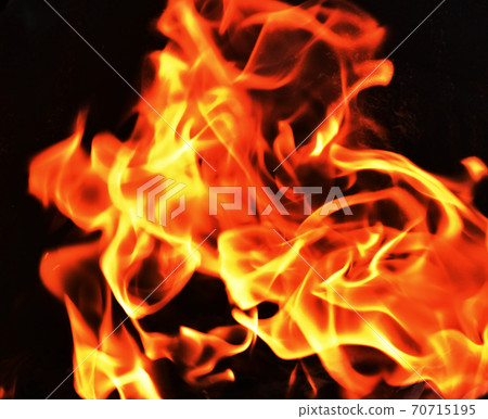 Orange color fire flame on black background	 70715195