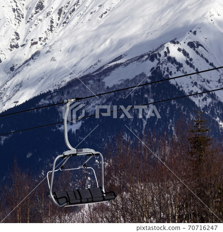 Ski lift in snow mountains at sun winter day Ski lift in snow mountains at sun winter day 70716247
