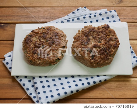 Beef hamburger steak on a ceramic plate 70716819
