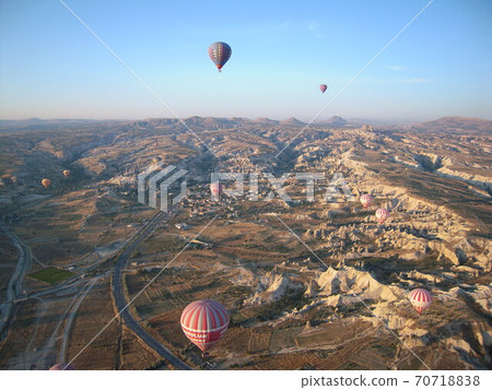Cappadocia and balloons looking from the sky on a clear early morning 70718838