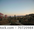 A balloon leaving for the sky of Cappadocia at dawn 70720984
