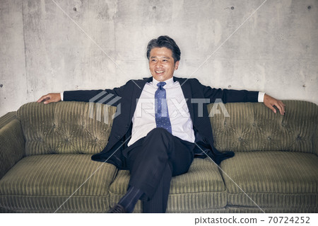 Men's portrait in a suit Men's portrait in a suit 70724252
