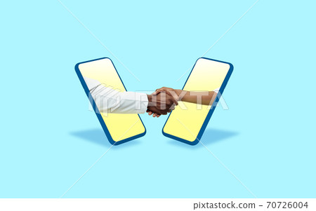 Hands gesturing through screens of mobile phones against blue background. Concept of social distance during coronavirus epidemic Hands gesturing through screens of mobile phones against blue background. Concept of social distance during coronavirus epidemic 70726004