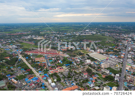 Aerial view of Cha Choeng Sao town, Chonburi near Bangkok, Thailand. Tourism city in Asia. Hotels and residential buildings with blue sky at noon. 70726424