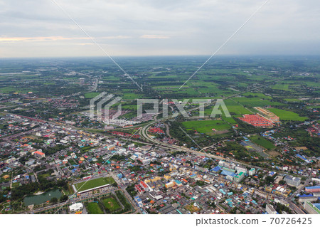 Aerial view of Cha Choeng Sao town, Chonburi near Bangkok, Thailand. Tourism city in Asia. Hotels and residential buildings with blue sky at noon. 70726425
