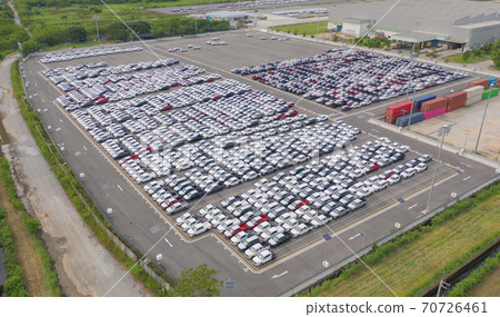 Aerial top view of new cars parking for sale stock lot row, dealer inventory import and export business commercial worldwide, Automobile and automotive industry distribution logistic global transport Aerial top view of new cars parking for sale stock lot row, dealer inventory import and export business commercial worldwide, Automobile and automotive industry distribution logistic global transport 70726461