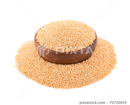 Amaranth seeds in wooden bowl, isolated on white background. Organic dry raw amaranth beans. 70726645