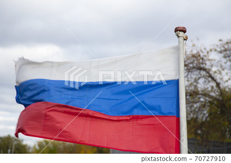 The Russian flag, growing in the wind. Flag of the Russian Federation 70727910