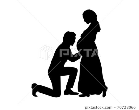 Silhouette husband kneels in front of his pregnant wife side view 70728066