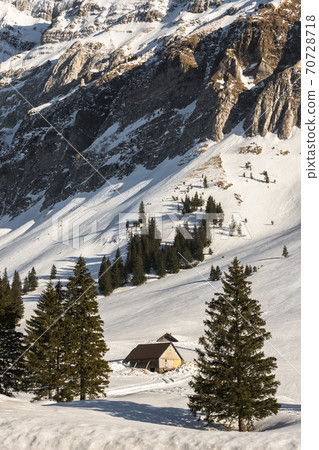 Winter landscape with mountain huts on the Schwaegalp, Canton Appenzell Ausserrhoden, Switzerland 70728718